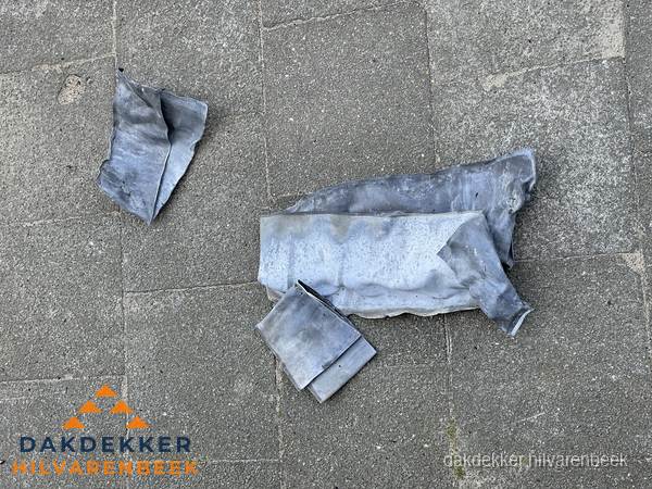 Oude verwijderde loodslabben na vervanging in Hilvarenbeek Oude verwijderde loodslabben na vervanging in Hilvarenbeek